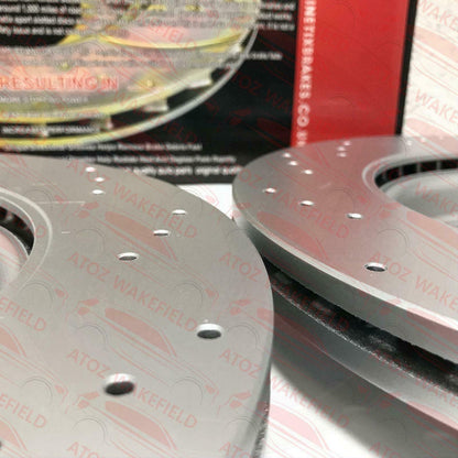 FOR VAUXHALL OPEL ASTRA J GTC VXR REAR DRILLED BRAKE DISCS BREMBO PADS 315mm